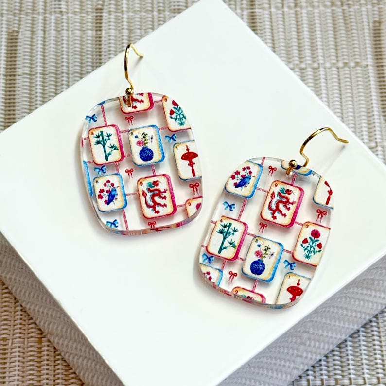 Mahjong lover earrings featuring multicolor tiles printed on clear acrylic