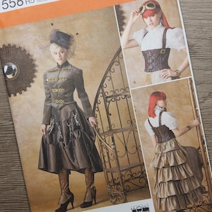 May include: Simplicity sewing pattern 1558 R5 featuring steampunk-inspired clothing designs. The pattern includes images of a jacket, skirt, corset, and accessories. The pattern's size range is US sizes 14-22.