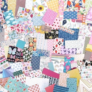 May include: A collage of colorful patterned paper scraps in various shapes and sizes. Designs include florals, polka dots, stripes, and geometric patterns in shades of pink, blue, yellow, and green. Ideal for scrapbooking and crafting projects.