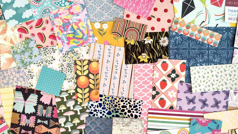 May include: A collage of patterned paper sheets in various designs and colors. The patterns include florals, fruits, geometric shapes, and abstract designs. Colors range from pinks and blues to yellows and greens, creating a vibrant and visually appealing assortment.