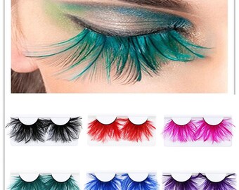 Spotted Feather False Eyelashes Black with Blue spots complete with adhesive Spotted Feather False Eyelashes Black with Blue spots complete with adhesive