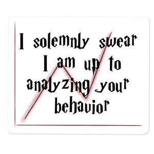 May include: White sticker with the text "I solemnly swear I am up to analyzing your behavior" in black gothic font. A red line graph is drawn across the text, with a red border.