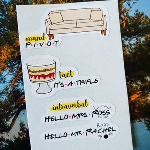 May include: Four stickers featuring iconic scenes and phrases from the popular TV show "Friends". The stickers feature a couch, a trifle dessert, and two phrases: "Pivot" and "Hello, Mrs. Ross".