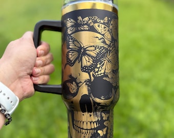 Laser Engraved Skulls and Butterflies Tumbler: 40 oz Quencher with Gold Rim
