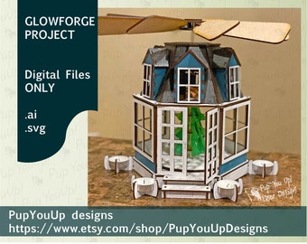 May include: A laser-cut wooden house with a blue roof and white trim, featuring a rotating fan on top. The image includes the text "GLOWFORGE PROJECT" and "Digital Files ONLY". The house has a glass-like enclosure and small candle holders.