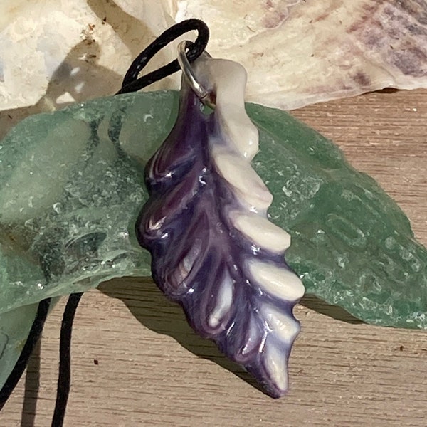 Carved Wampum Feather pendant