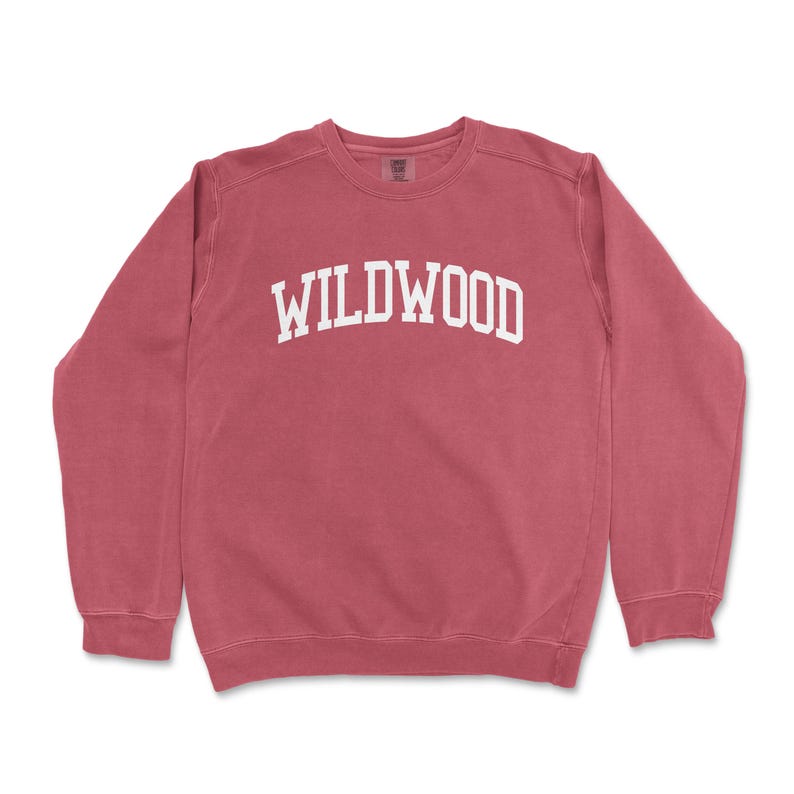 a red sweatshirt with the word wildwood printed on it