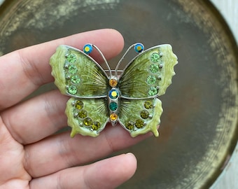 Broche vintage de mariposa esmaltada en tono dorado y brillantes de color verde claro con diamantes de imitación