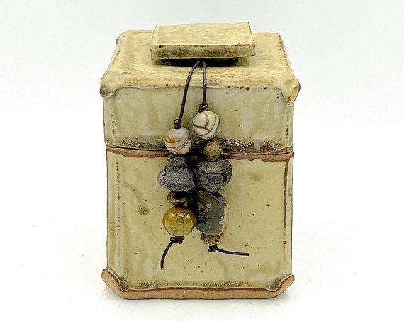 Rustic handmade stoneware box with ethnic beads