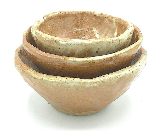 Set of three nested handmade stoneware bowls