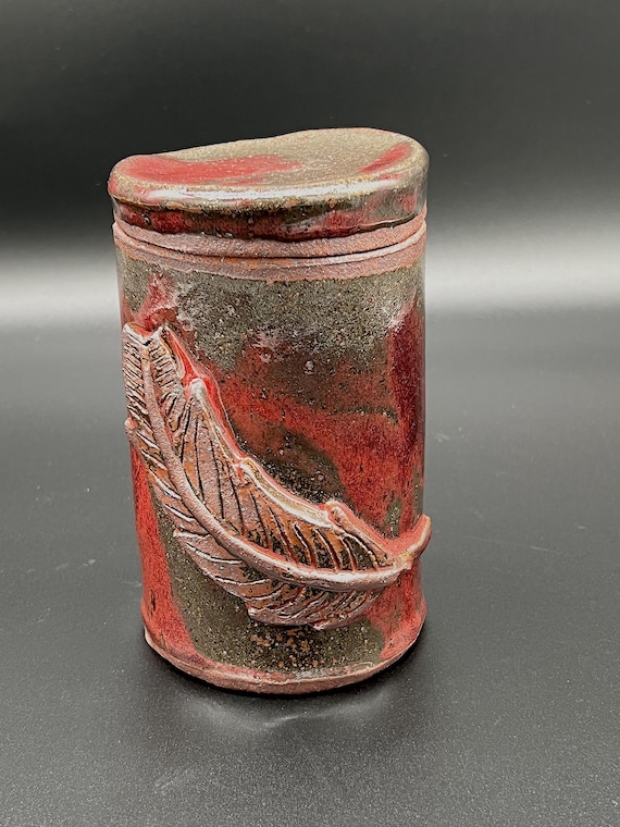 Tall handmade rustic pottery stoneware box with feather accent