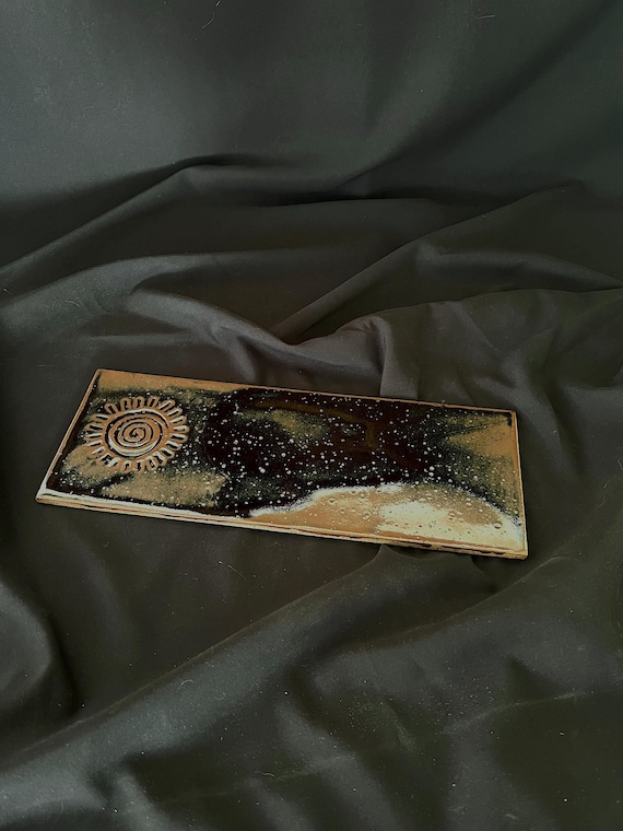 Rustic handmade stoneware platter charcuterie or cheese board with carved sun detail
