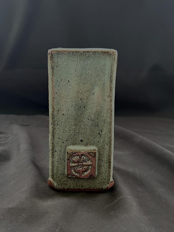 Handmade rustic pottery stoneware vase with floral medallion