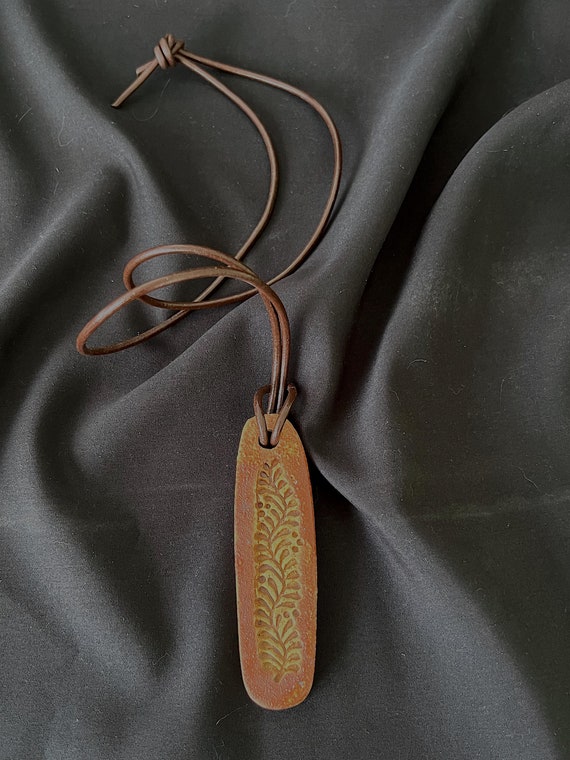 Rustic handmade stoneware amulet talisman necklace