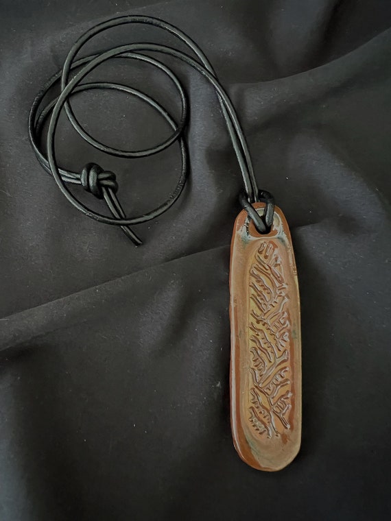 Rustic handmade stoneware amulet talisman necklace