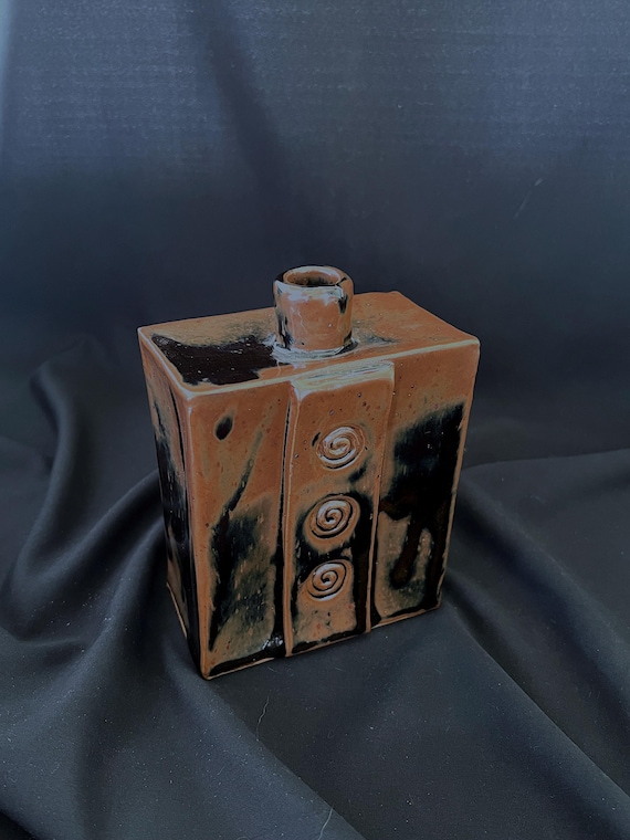 Rustic handmade stoneware vase with spiral detail