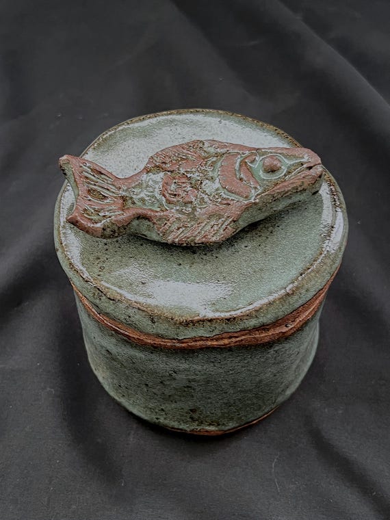 Handmade rustic pottery stoneware box with fish