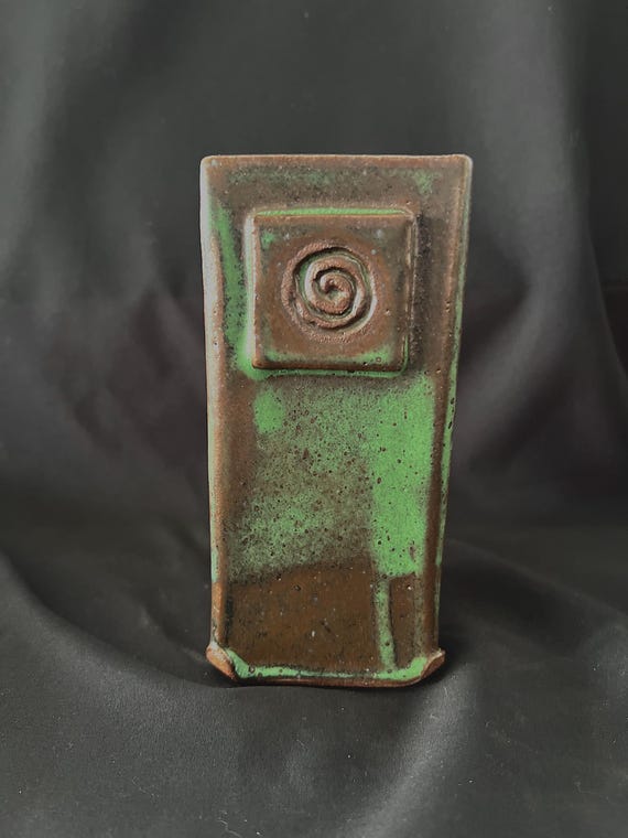 Rustic green handmade pottery stoneware vase with spiral medallion