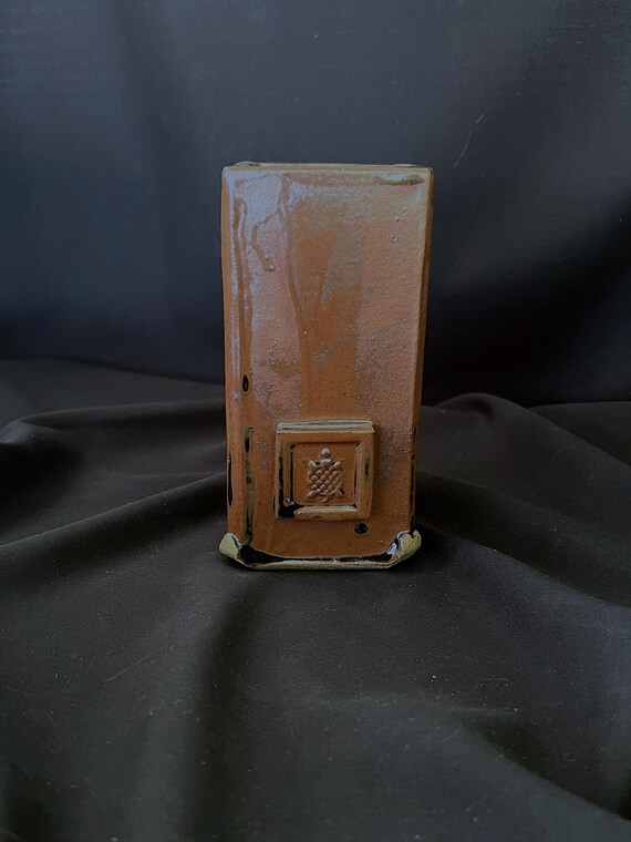Handmade rustic stoneware vase with turtle medallion detail