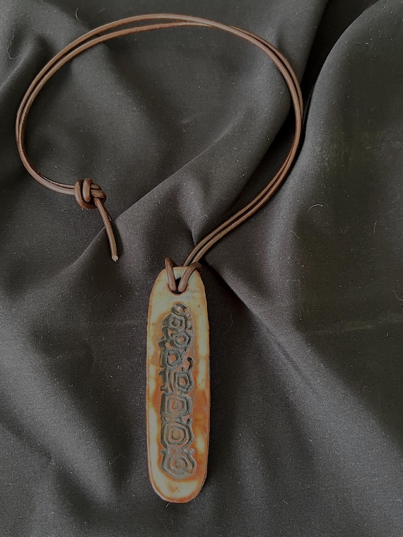 Rustic handmade stoneware amulet talisman necklace
