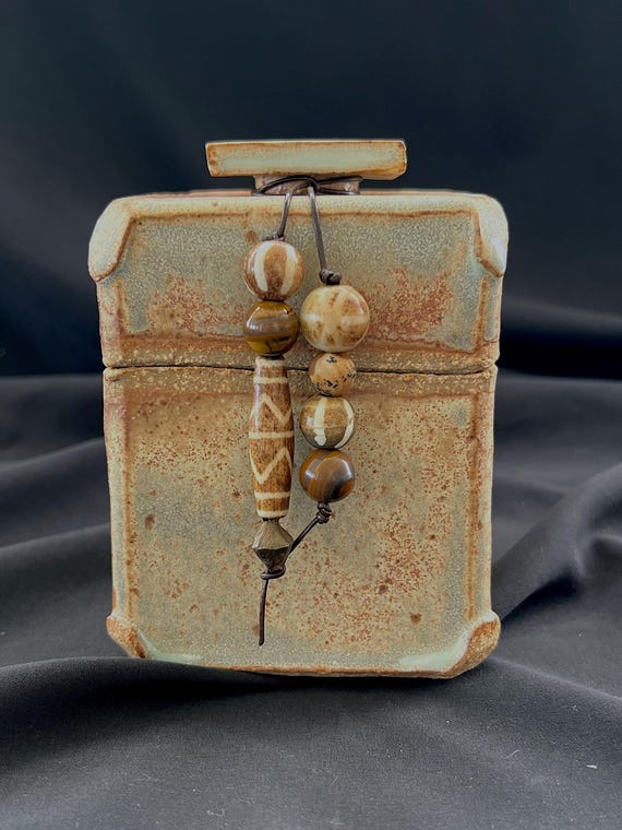 Spirit box, a rustic handmade stoneware box with ethnic beads