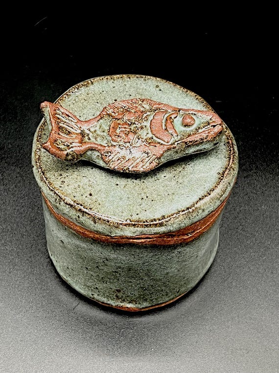 Handmade rustic pottery stoneware box with fish