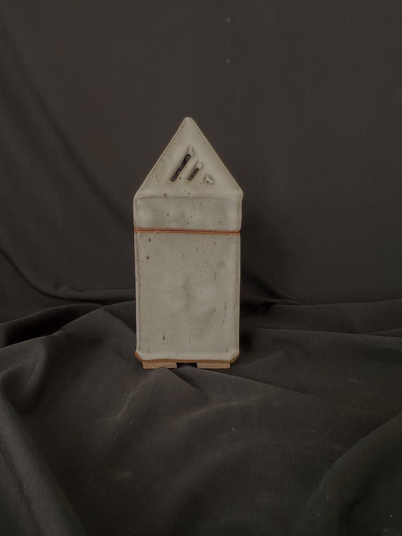 Handmade stoneware white tower box with pierced lid