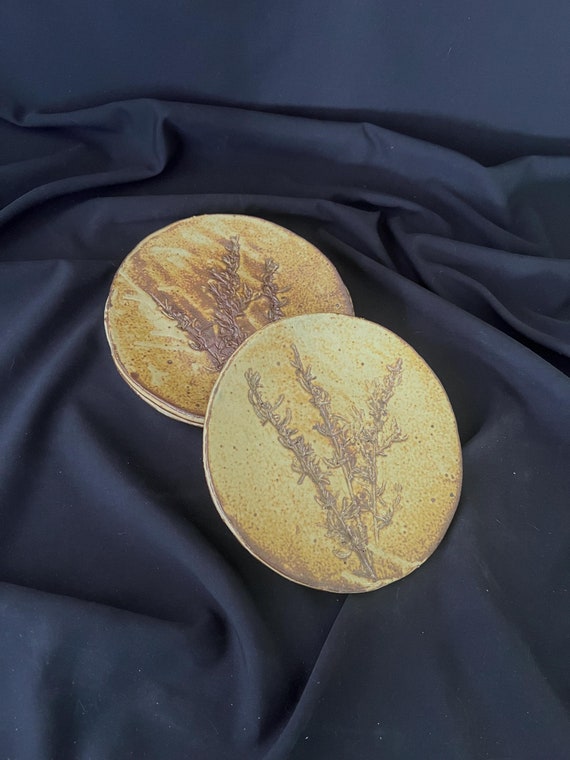 Set of four handmade stoneware dessert or salad plates with impressed floral detail