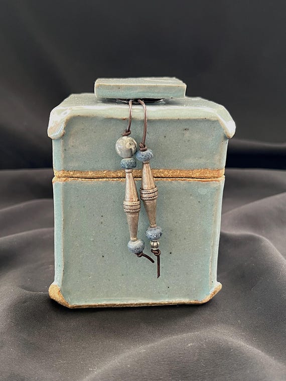 Spirit box, a rustic handmade stoneware box with ethnic beads