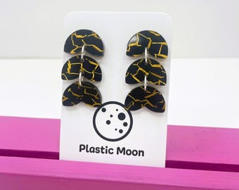 Pendientes colgantes de hojas con efecto craquelado negro