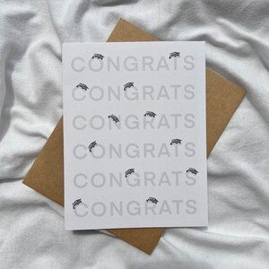 Tarjeta de felicitación de graduación con sombreros