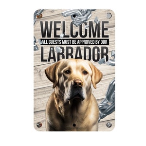 May include: A metal sign with a rustic wood background featuring a yellow Labrador Retriever. The sign reads "Welcome, All guests must be approved by our Labrador".