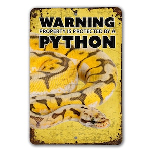 May include: A yellow and black python snake coiled on a yellow background with the text "WARNING PROPERTY IS PROTECTED BY A PYTHON" on a metal sign.