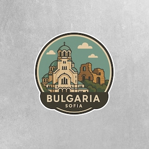 May include: A round sticker featuring a stylized illustration of a Bulgarian landmark. The design includes a beige church with green domes, ruins, and the text "BULGARIA SOFIA" in a dark brown banner.