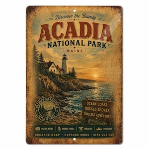 May include: A rectangular metal sign featuring a vintage-style illustration of Acadia National Park in Maine. The design includes a lighthouse on a rocky cliff, a sunset over the ocean, and text reading Discover the Beauty, Acadia National Park.