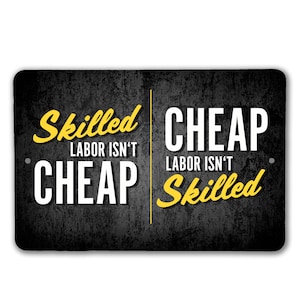 May include: Black and white metal sign with the text "Skilled Labor Isn't Cheap" and "Cheap Labor Isn't Skilled" in yellow and white lettering.
