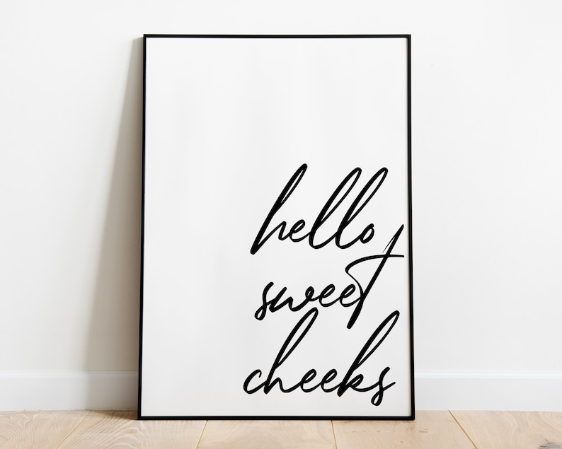 May include: Black and white printable wall art with the text "hello sweet cheeks" in a handwritten font.