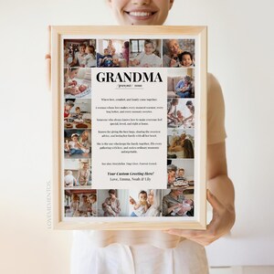 May include: A framed print held by a person, featuring a collage of family photos. The print has the word "GRANDMA" at the top, with text below describing a grandmother. The frame is light brown.