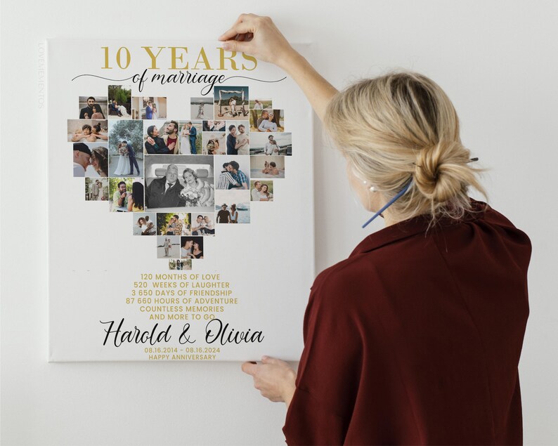 May include: A white canvas print with a heart-shaped collage of photos celebrating a 10th wedding anniversary. The text "10 YEARS of marriage" is in gold lettering at the top. The names "Harold & Olivia" are written in black cursive below the collage. The date "08.10.2014 - 08.18.2024" and the words "HAPPY ANNIVERSARY" are also included.