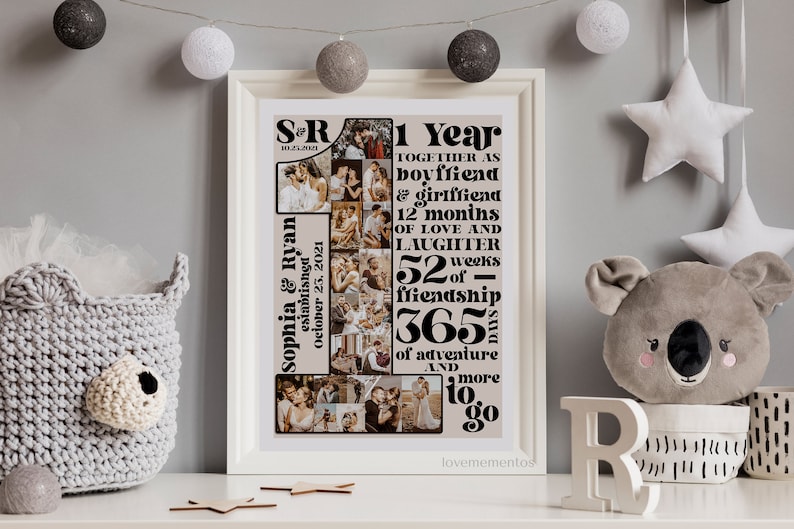 May include: A framed print featuring a collage of photographs and text commemorating a couple's first anniversary. The text reads "S&R established October 23, 2021, 1 Year Together as Boyfriend & Girlfriend, 12 Months of Love and Laughter, 52 Weeks of Friendship, 365 Days of Adventure and More to Go".