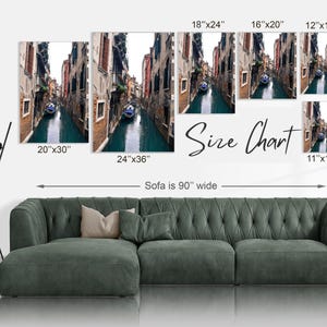 May include: Size chart for a canvas print of a canal in Venice, Italy. The chart shows different sizes of the print, ranging from 11 inches by 14 inches to 24 inches by 36 inches. The print features a narrow canal with buildings on either side and a gondola in the water.