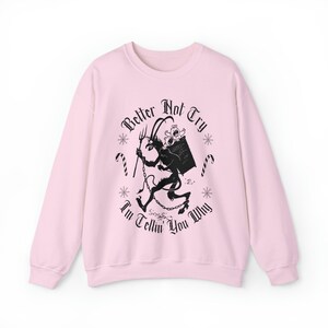 Krampus Sweatshirt Scary Christmas Crewneck Sweatshirts Spooky Christmas Tees and Hoodies Pajamas Pullover Creepy Ugly Christmas Sweaters Light Pink