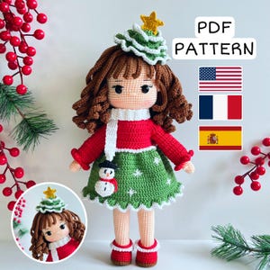 May include: Crocheted doll wearing a red and green Christmas outfit, including a tree-shaped hat with a yellow star. The doll has brown curly hair and a white scarf. A small snowman is on the green skirt. The text "PDF PATTERN" is visible.