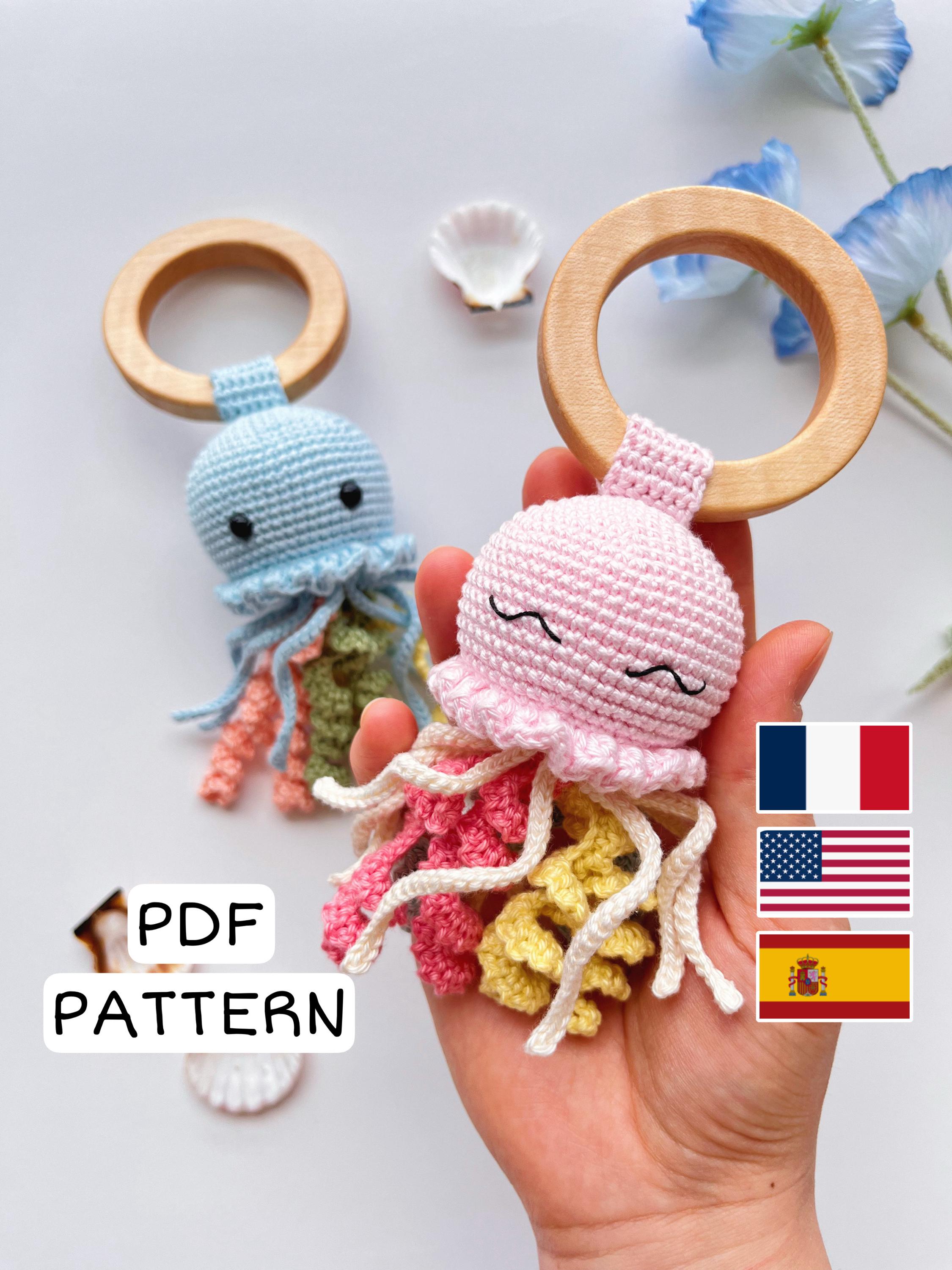 39 Crochet Jellyfish Patterns: Amigurumi, Rattles, Squish, and Keychains 1 Crochet Jellyfish Rattle
