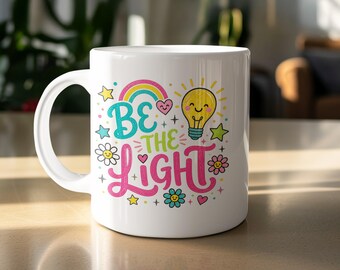 Be The Light Mug, Inspirational Coffee Cup, Teacher Gift, Positive Vibe Motivational Drinkware with Rainbow & Smiling Lightbulb Design