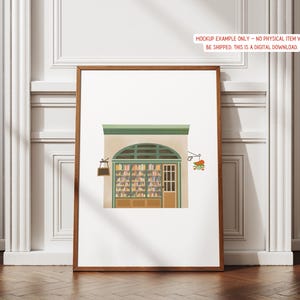May include: A framed print featuring an illustration of a bookstore facade with a green awning, arched window, and a door. The window displays shelves of books. A small sign and floral arrangement hang outside. The text at the top says: MOCKUP EXAMPLE ONLY - NO PHYSICAL ITEM WILL BE SHIPPED. THIS IS A DIGITAL DOWNLOAD.