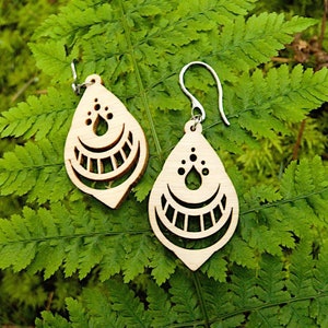 Geometric laser cut earrings in wood and stainless steel