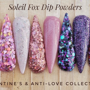 May include: A collection of Soleil Fox Dip Powders in various colors and textures. The nail samples showcase glitter, flakes, and solid colors, including pinks, purples, and reds. The text at the top reads "Soleil Fox Dip Powders" and the text at the bottom reads "Valentine's & Anti-Love Collections."
