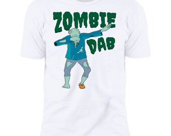 May include: White t-shirt featuring a cartoon zombie dabbing. The zombie is light green with a blue jacket and gray pants. The text "ZOMBIE DAB" is in green above the zombie.