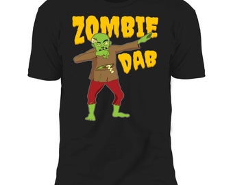 May include: Black t-shirt featuring a cartoon zombie dabbing. The zombie is green with red pants and a torn brown shirt. The words "ZOMBIE DAB" are in yellow, stylized text above the zombie.